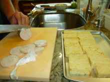 Goose fat brioche being sliced up and the Torchon being sliced